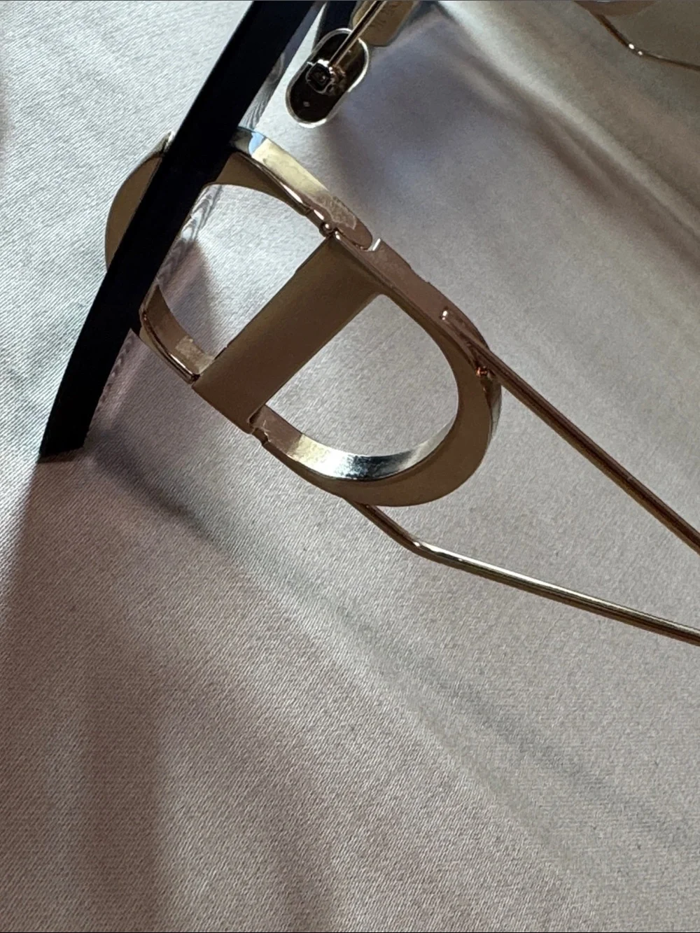 Dior Women's Rimless Sunglasses with Dark Blue Lenses and Gold Temples